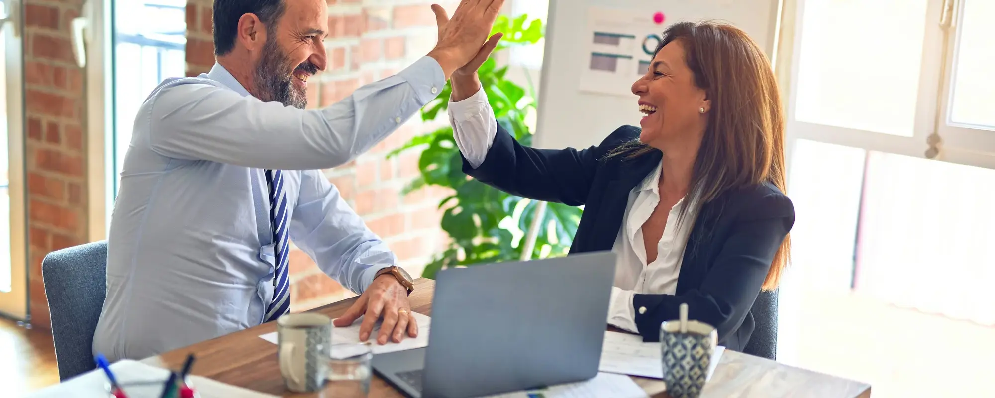 Career Opportunities Team celebrating success - M-SQUARE's positive and collaborative work culture